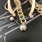 Rib, Pearl, and chain earrings